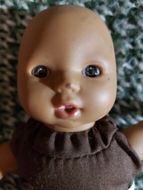 Vinyl baby doll with cloth body, Ashton Drake 'M&M's Melt in Your Heart' S. Rawn
